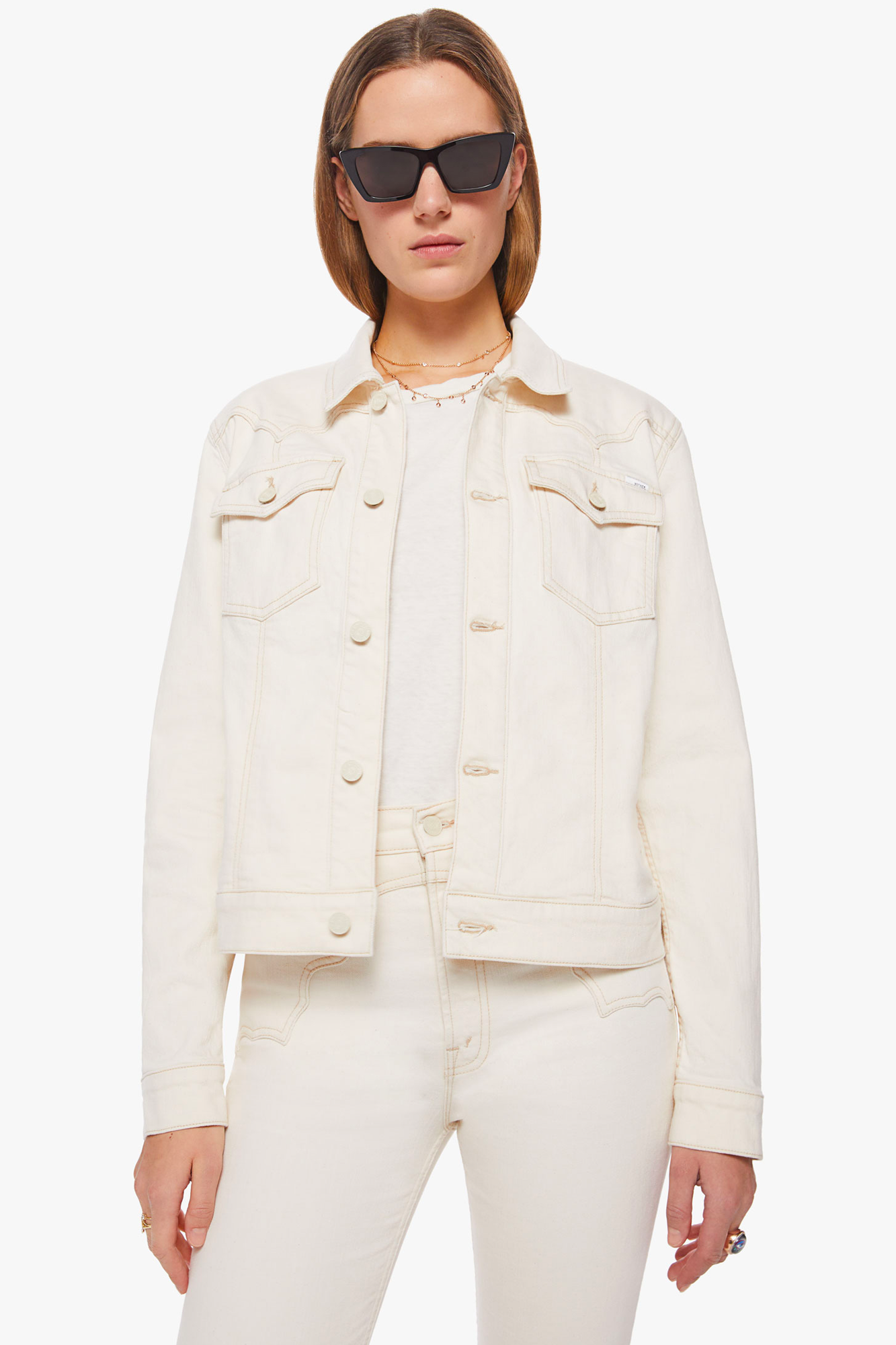 The Buckle Bunny Bruiser Jacket from Mother in Act Natural is an off white, mid season, layering piece. Wear over a Mother T-shirt or dress for going into Fall. 