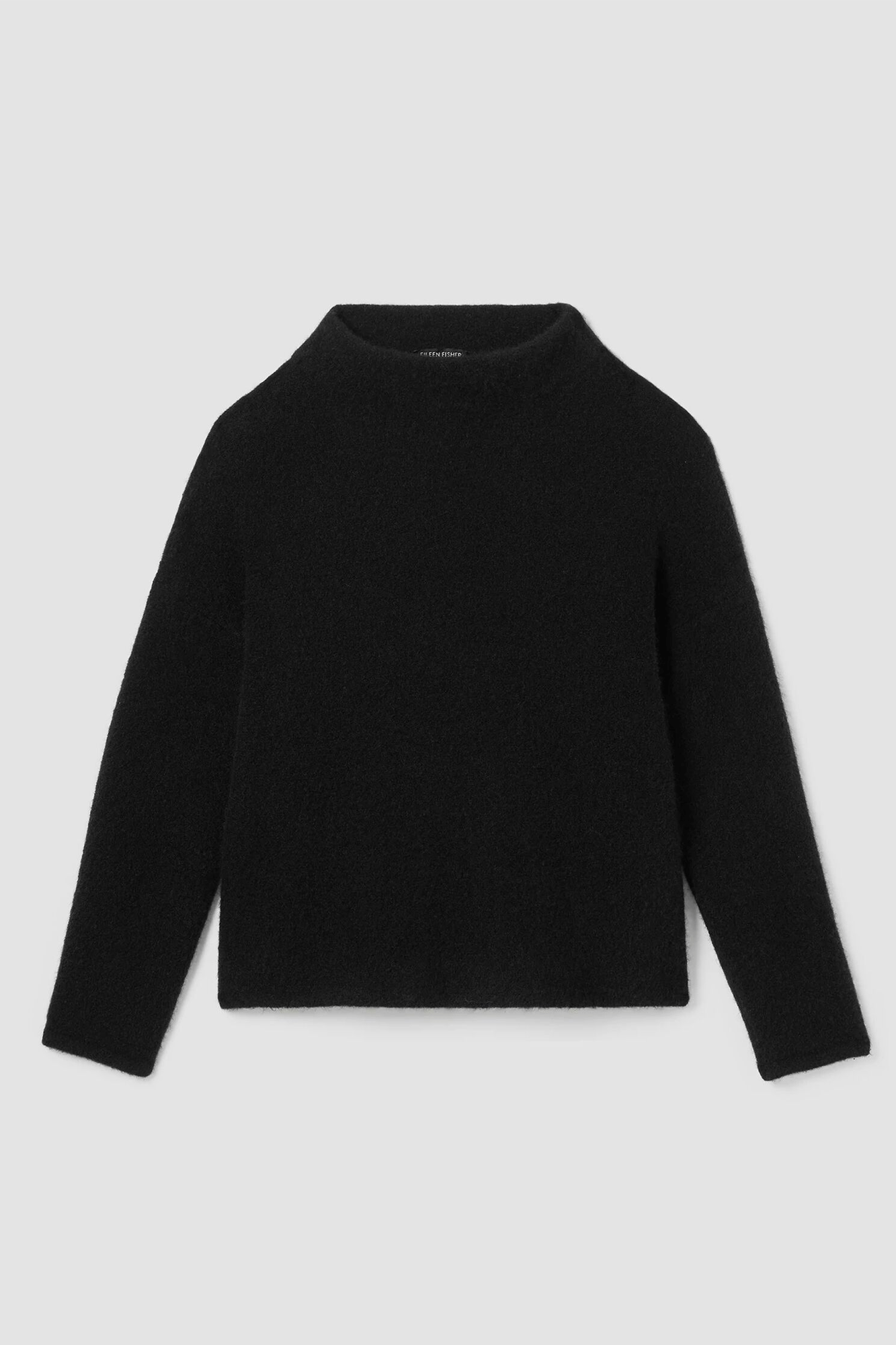 This Funnel Neck Top offers an effortless, luxurious look. Crafted from a soft blend of cashmere and silk, it adds subtle luxury to any wardrobe. Its classic funnel neckline adds a touch of elegance and an effortlessly chic look.