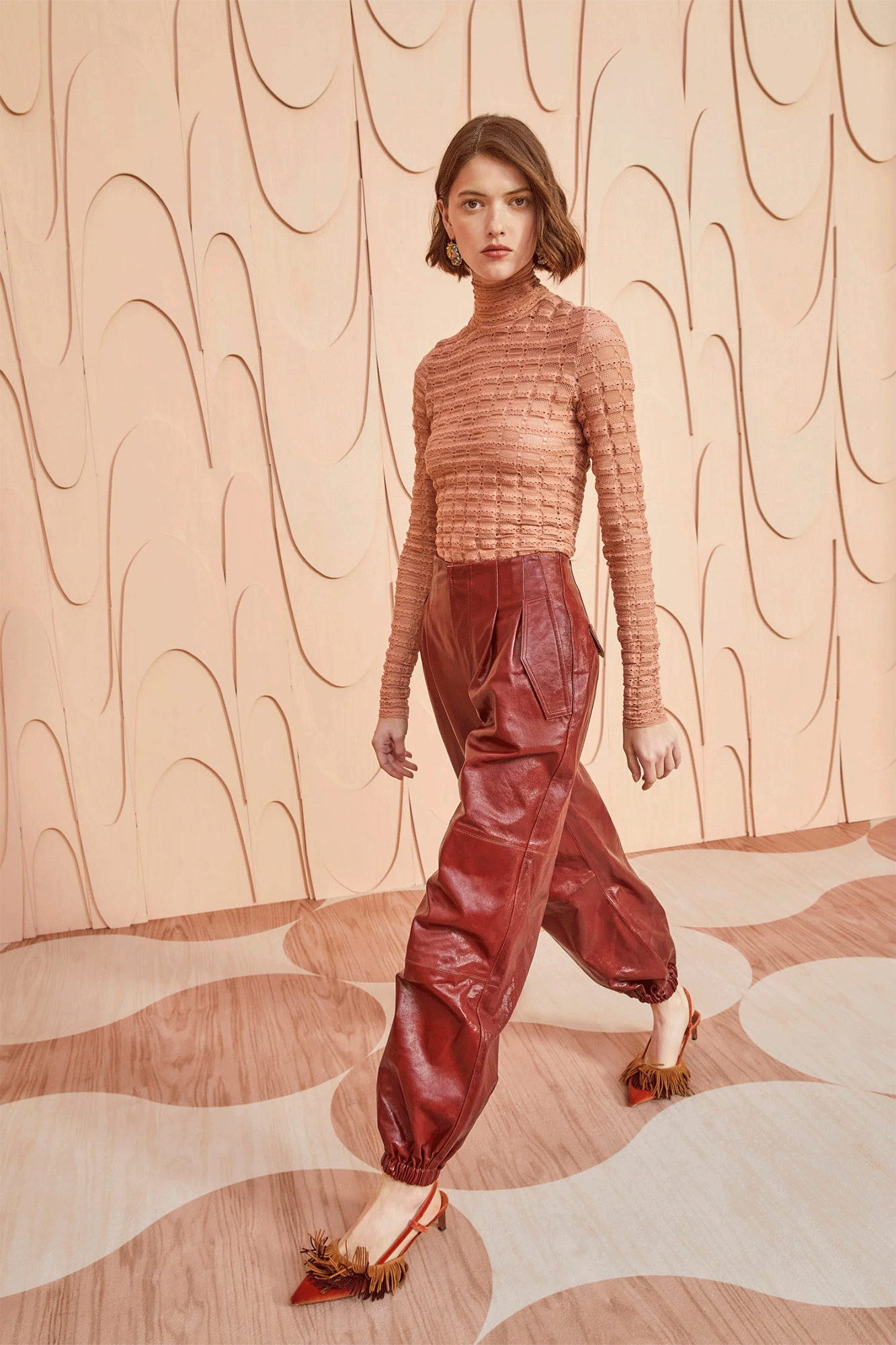 Crafted from luxurious waxed mahogany leather, the Cyrus Pant from Ulla Johnson is designed for lasting quality. Enjoy the soft supple texture and subtle crackled finish, along with convenient side-seam pockets and elastic cuffs. A bandless waistband tailored for a sleeker fit completes the look.