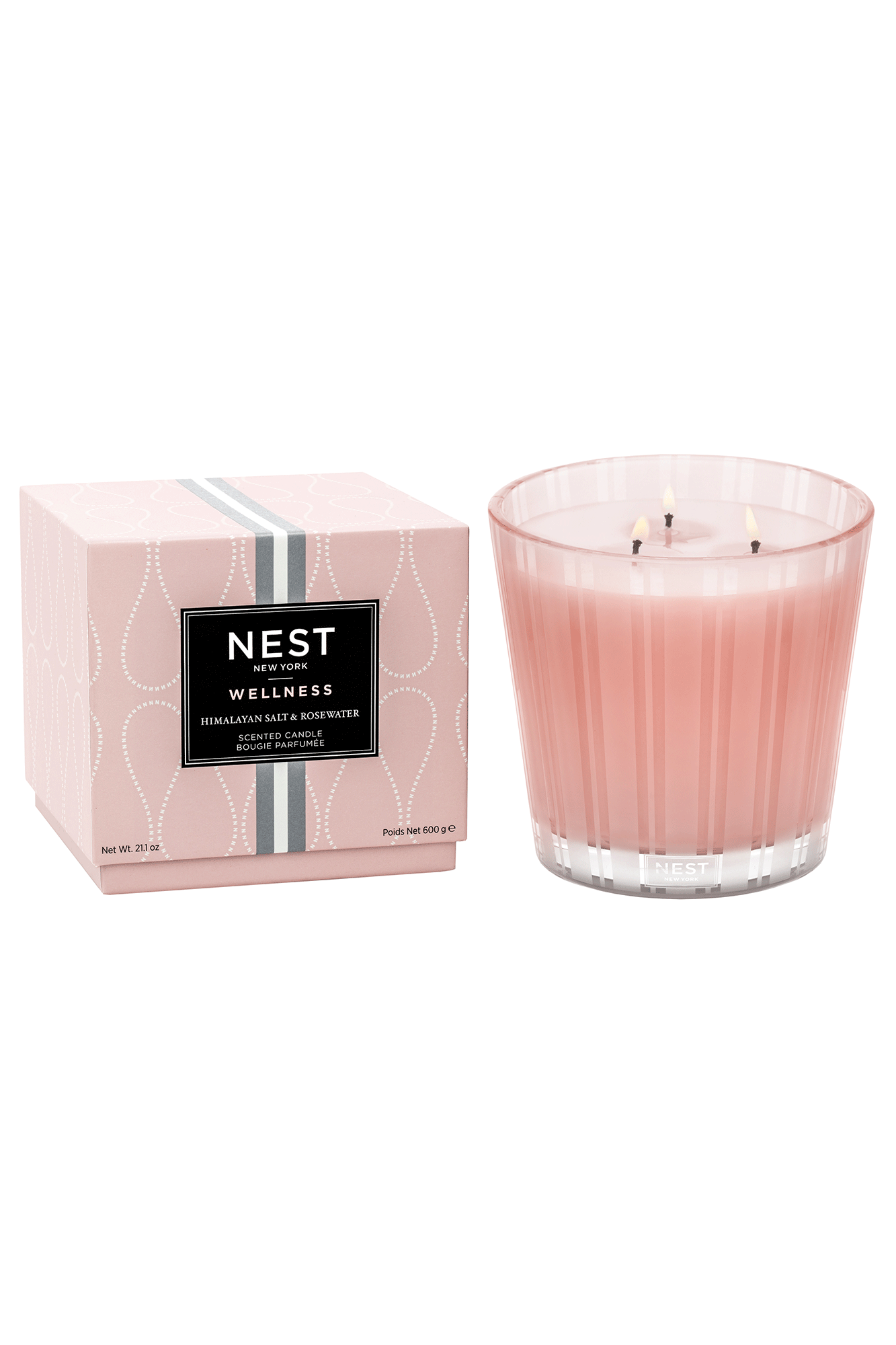 Enjoy a calming atmosphere with the Himalayan Salt & Rosewater 3 Wick Candle from Nest. Infused with notes of rosewater, geranium, salted amber, and white woods, this scented candle will help to ease your mind and soothe your spirit.