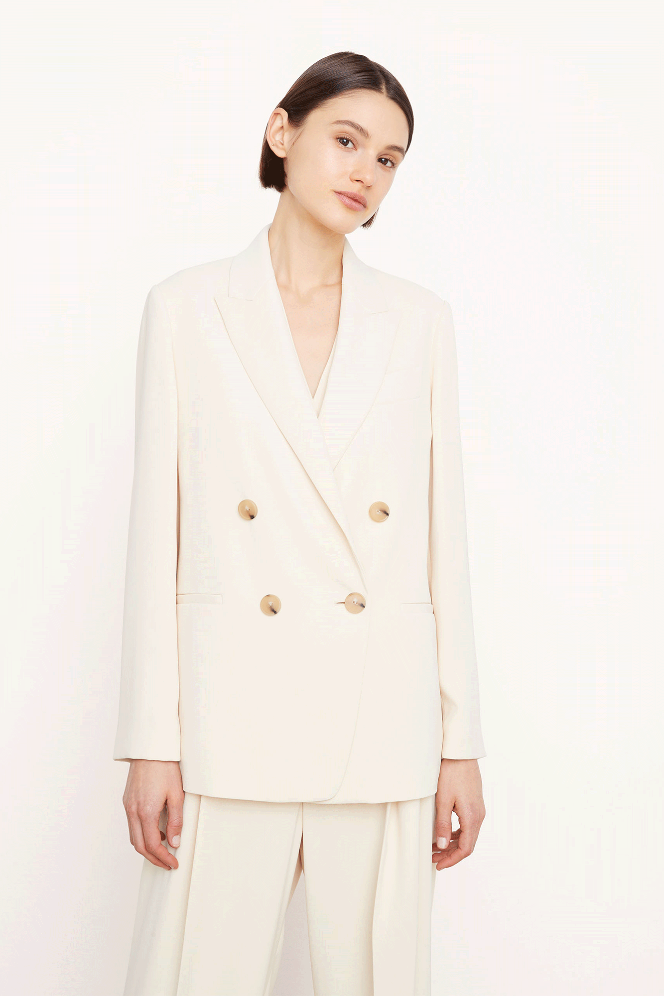 Our Crepe Double Breast Blazer from Vince offers a sleek addition to any wardrobe.