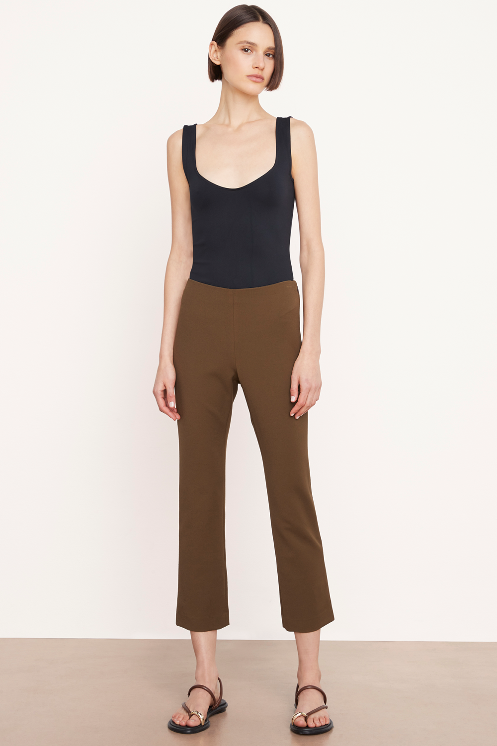 This High Waist Crop Flare pant from Vince is crafted from Italian stretch cotton for a tailored fit and stylish flare at the knee