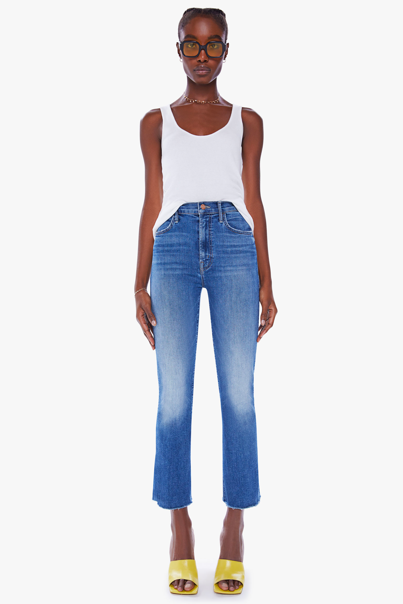 The bestselling Hustler Ankle Fray from Mother is designed for a flattering high-rise fit, featuring an ankle-length inseam and a raw hem. This stretch denim style is available in a mid-blue wash with fading throughout for maximum versatility. Pick your potion for a modern look and all-day comfort.