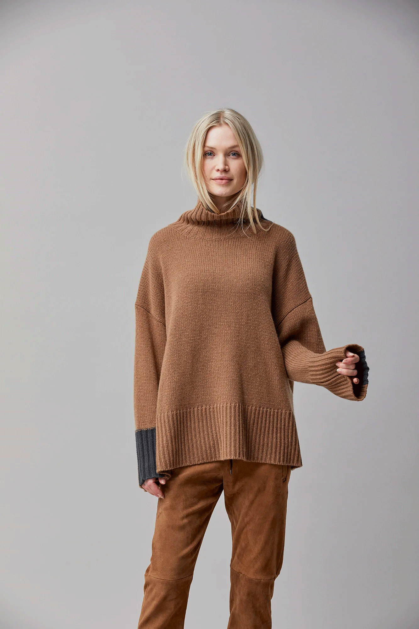 The Ribbed Rollneck Sweater from Kristensen Du Nord adds instant sophistication to any outfit. Crafted with cashmere, this luxurious piece offers a soft, comfortable warmth that you'll love. Elevate your style with the epitome of luxury.