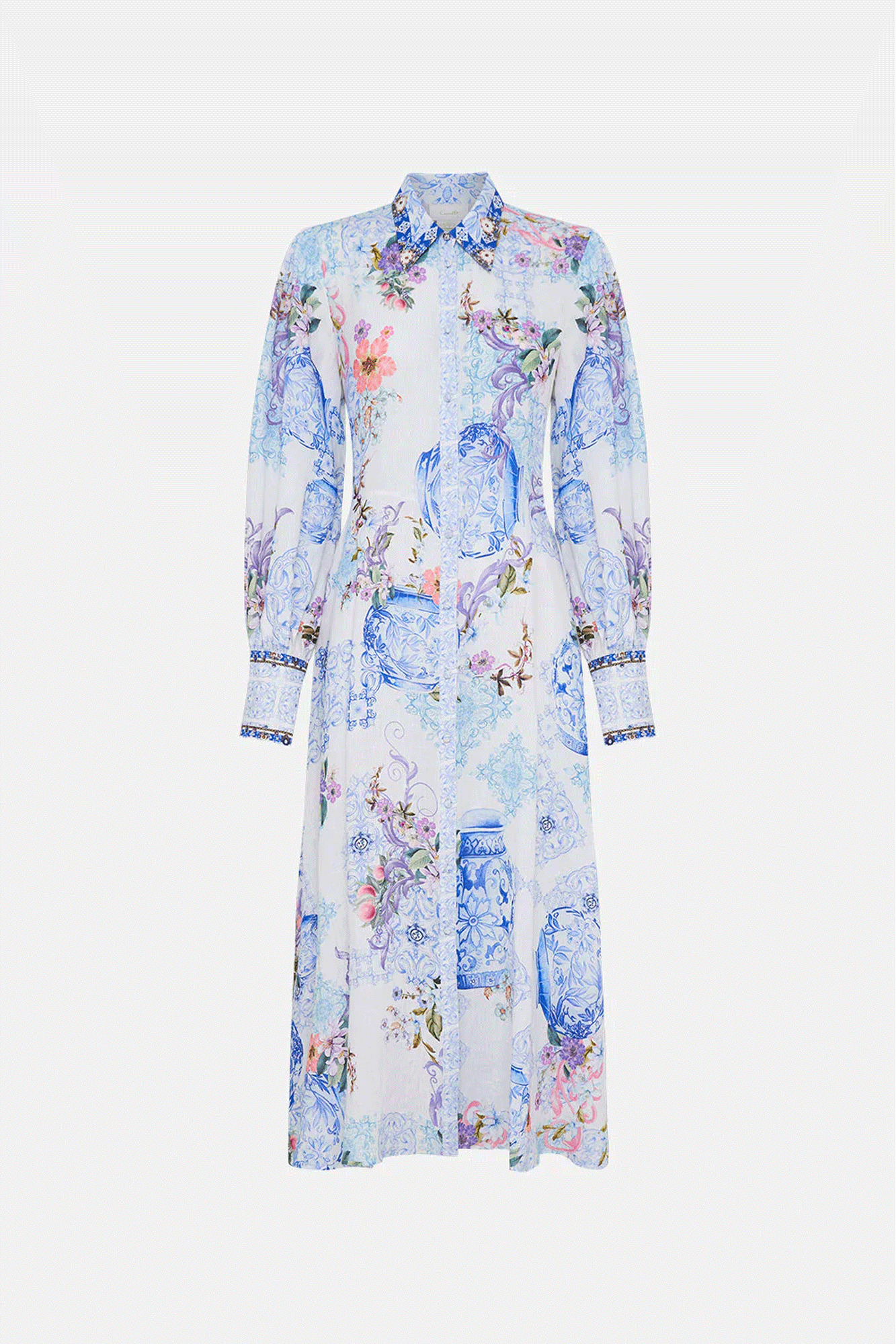 Elevate your wardrobe with this luxurious Waist Tie Shirt Dress from Camilla. It exudes an eye-catching aesthetic of intricate tile mosaics, delicate pastel florals, and a striking full-length silhouette.