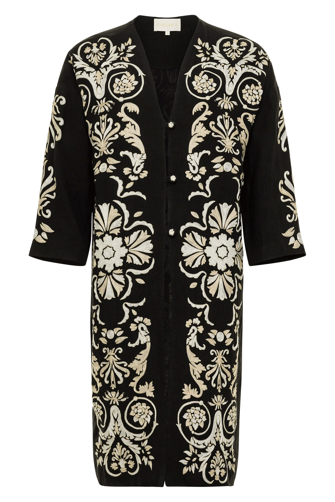 This Eros Embroidery Coat from Carolina K is a stylish and sophisticated piece for your wardrobe. The robe styling, wide sleeves, and oversized bodice provide a comfortable and flattering fit. The finely embroidered details add a unique touch of texture and visual interest. The button closure and full lining provide both warmth and durability.