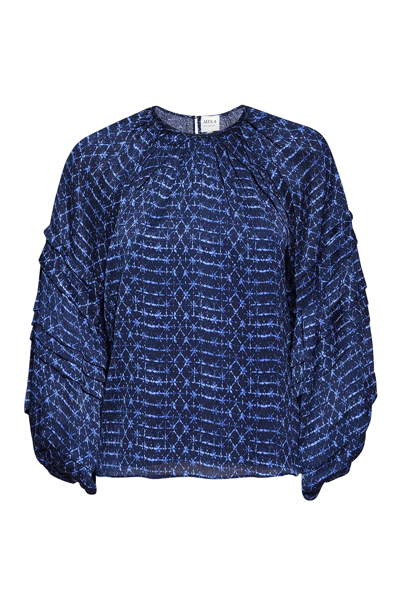 The Victoire Top is the perfect choice for an evening look. Cut in midnight shibori print chiffon, it is detailed with double-edged pleated ruffles along the sleeves and elastic cuffs. Finishing with a back button keyhole closure, the Victoire Top easily pairs with leather pants and boots for a stylish look.