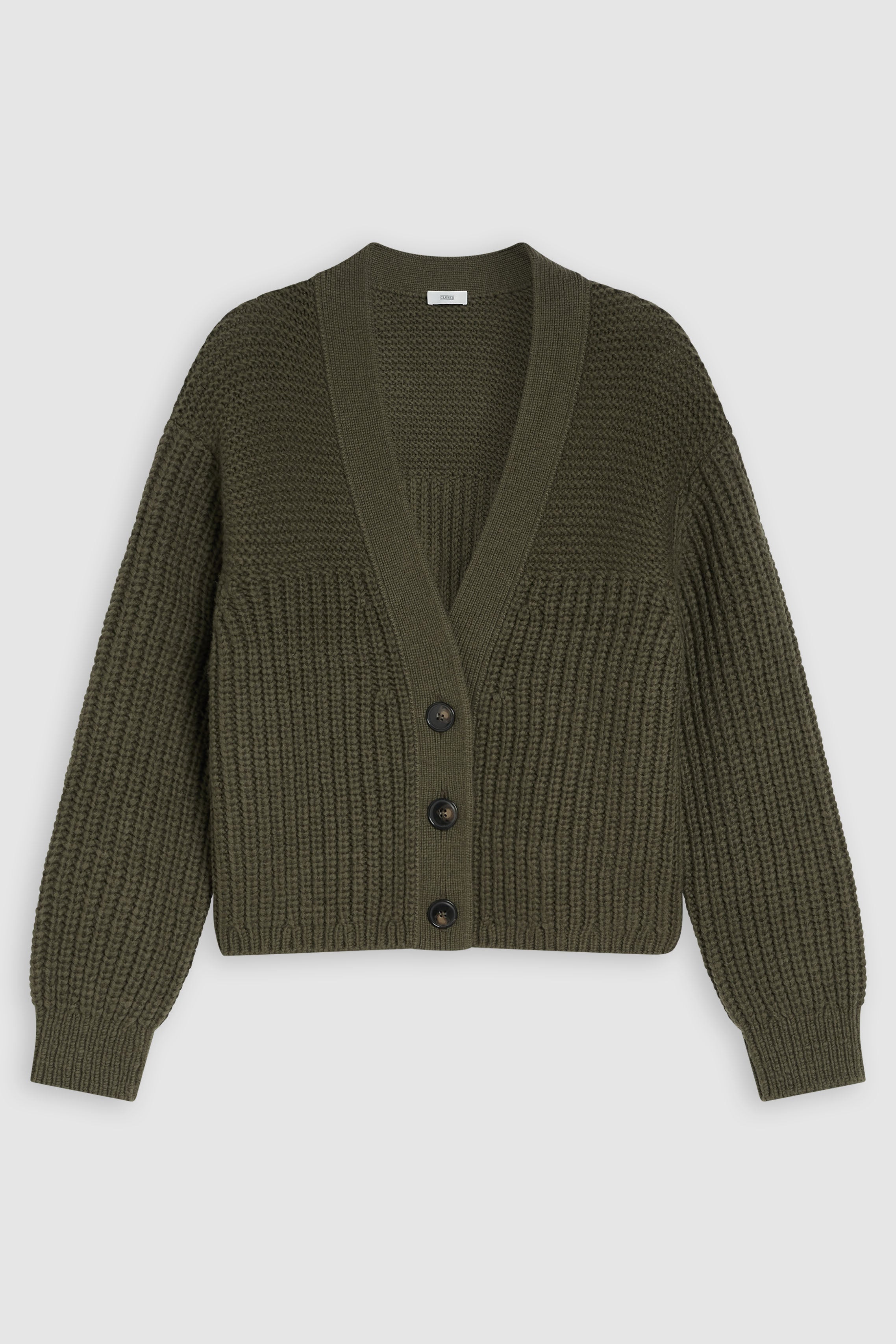 The V Cardigan Long Sleeve from Closed is crafted from a blend of alpaca and polyamide for increased comfort and durability. The chunky knit and reverse knit details provide stylish texture, while the horn look buttons tie the classic aesthetic together. 