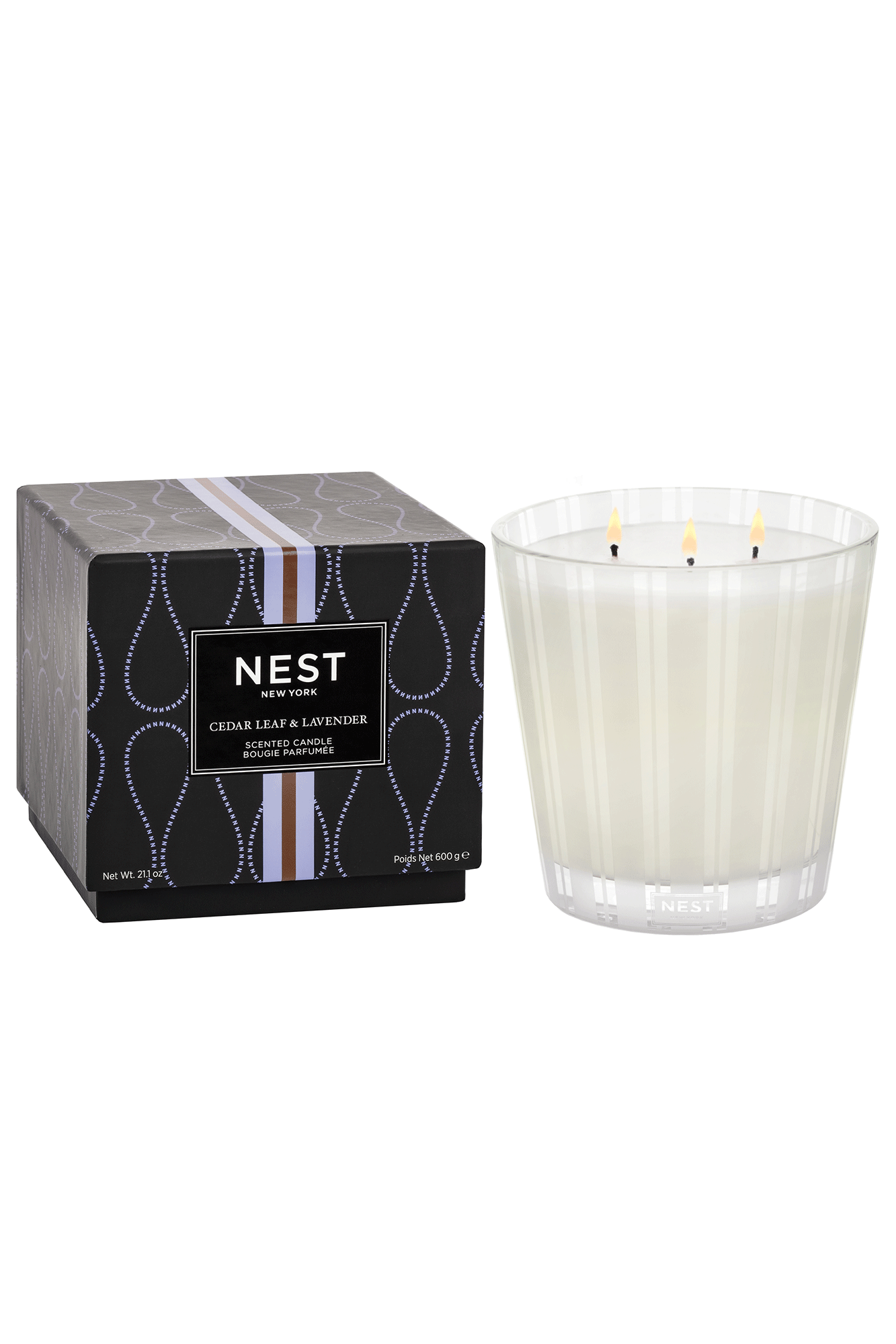 Create a calming, spa-like atmosphere with this 3 Wick Candle from Nest. Featuring a blend of rosemary, lavender, and sage with cedar leaves, it provides an herbaceous scent to any room. Enhance your ambiance with this long-lasting candle.