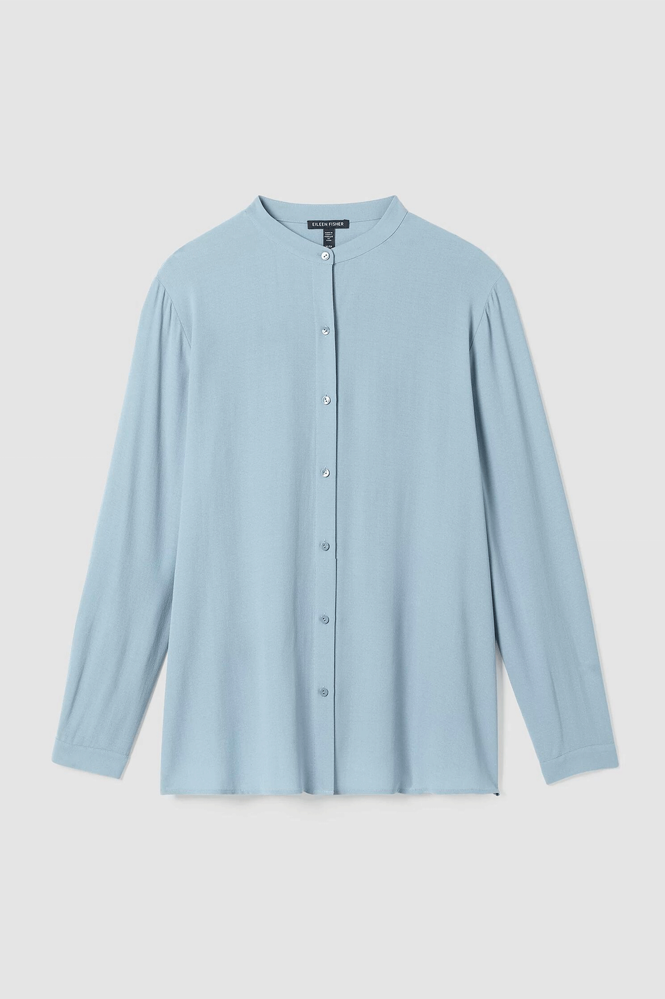 Experience effortless elegance with this Mandarin Collar Long Shirt from Eileen Fisher. Crafted from our signature Silk Georgette Crepe, this stylish piece is designed with a button-front shirt and understated neckline. Perfect for day or night looks.