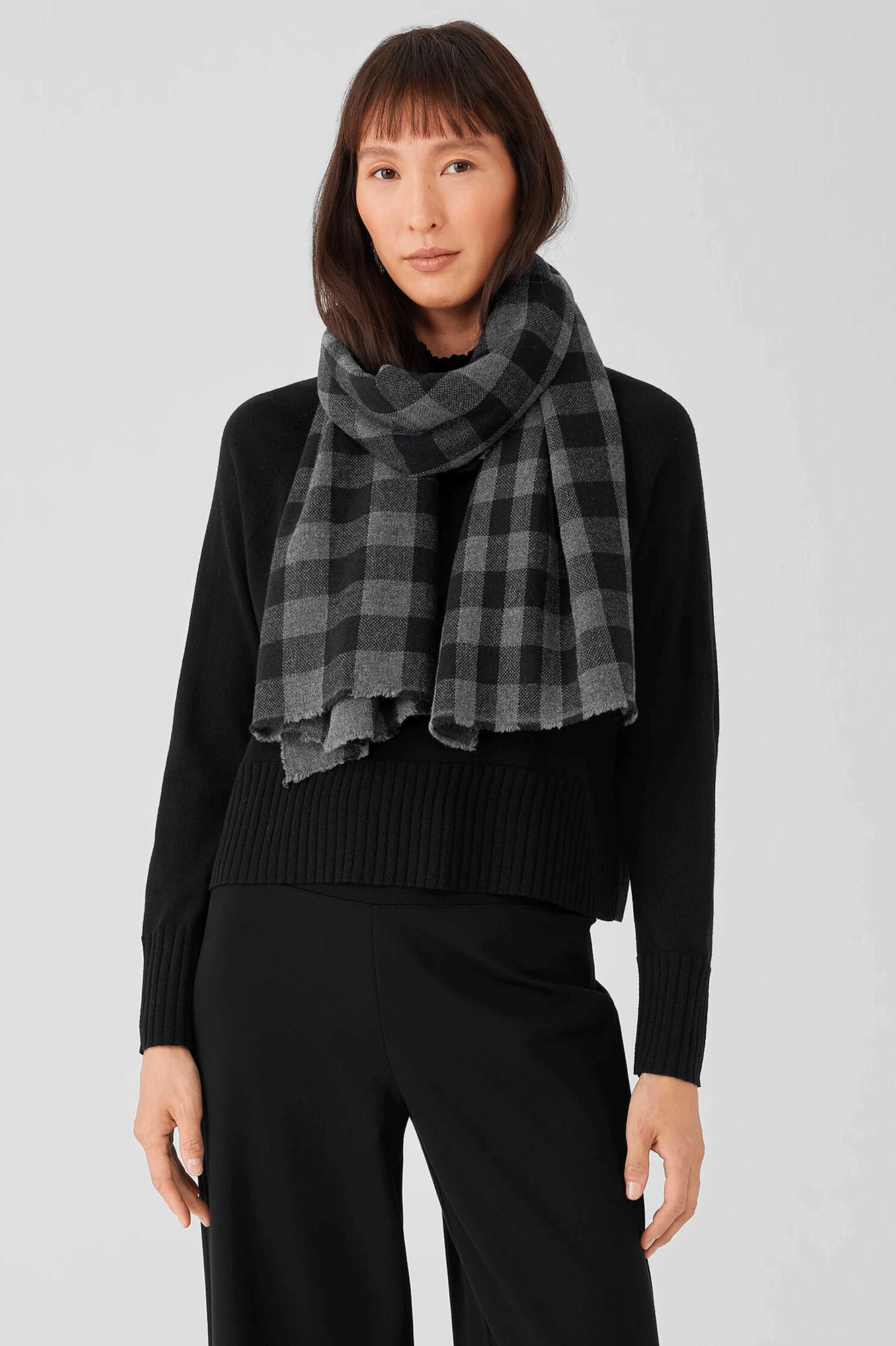 This remarkable Wash Wool Check Scarf from Eileen Fisher is yarn-dyed to create a unique check pattern, and washed for a soft touch. Its light wool fabric provides effortless wear that you can enjoy all year round.