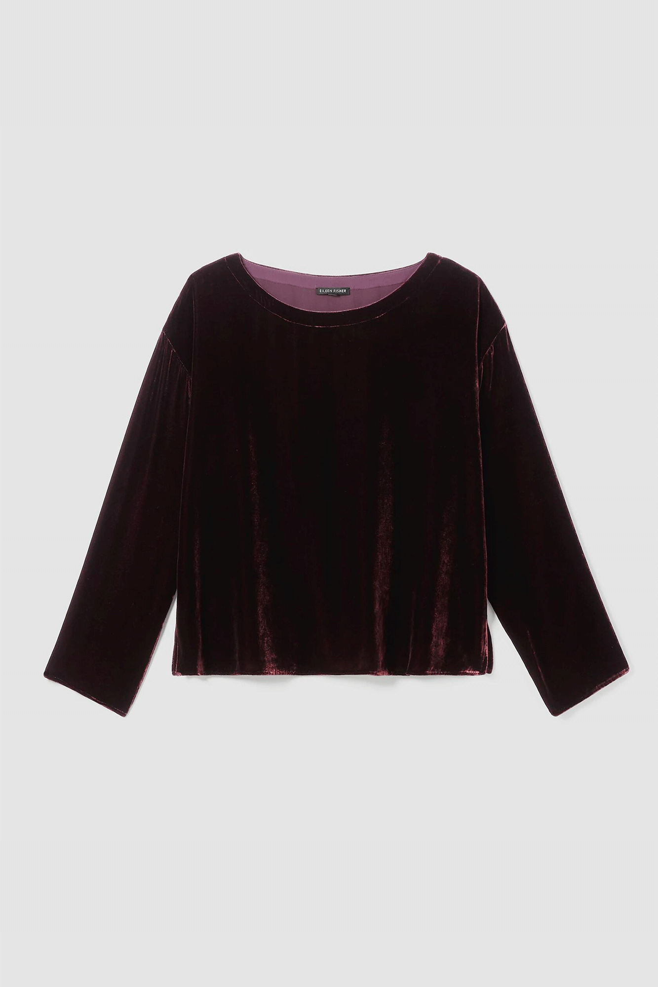 This luxurious Ballet Neck Top from Eileen Fisher is made from a lush blend of shimmering velvet and silk with a soft, drapey fit. Its ballet neck and side slits make it perfect for everyday wear and the washable material makes it incredibly easy to care for.