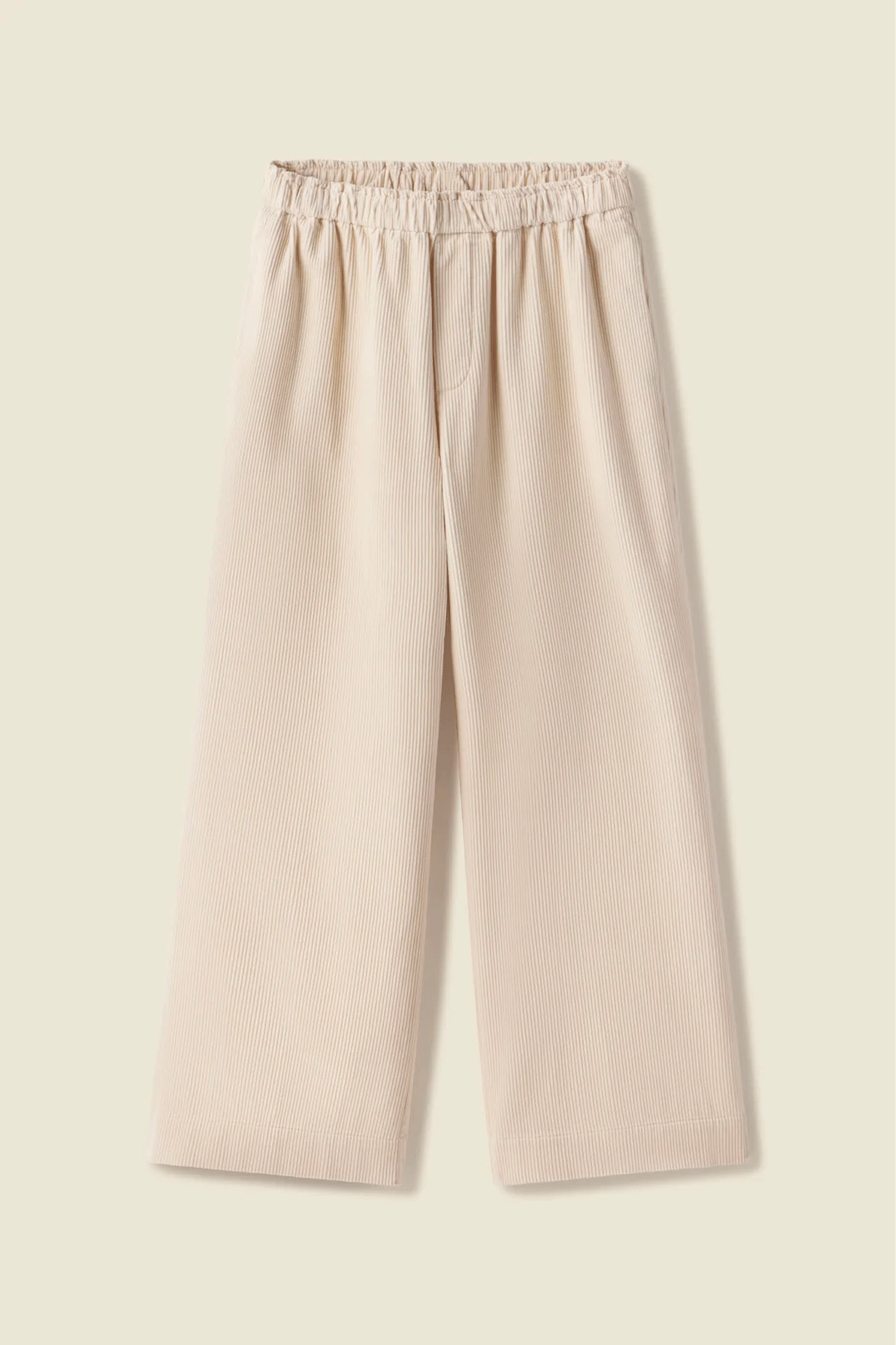 The Leona Pant from Trovata features a wide, soft elastic waistband and a bit of ruffle at the waist to complete any look. The straight-leg fit is made from 100% cotton for a comfortable, stylish finish. Additional details include a faux fly and two pockets in the side seams. A perfect choice for any occasion.