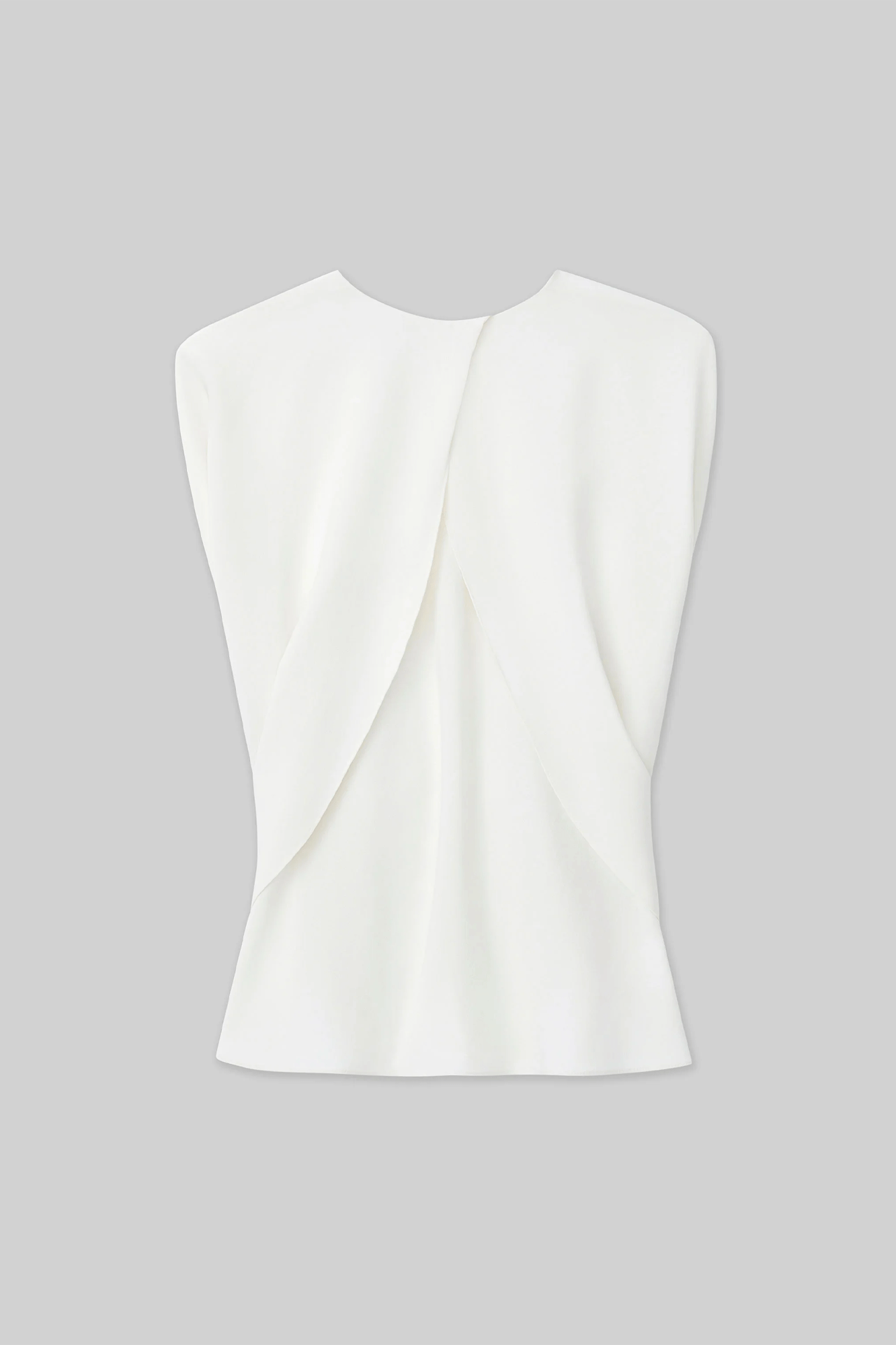 Achieve effortless elegance in this Shawl Sleeve Blouse from Lafayette 148. Crafted from Finesse Crepe, this bias-cut blouse can be worn as a draped shawl, off-the-shoulder, cape, or cowl for a unique, timeless look. The trimmed jewel neckline and deep keyhole back add a touch of sophistication.