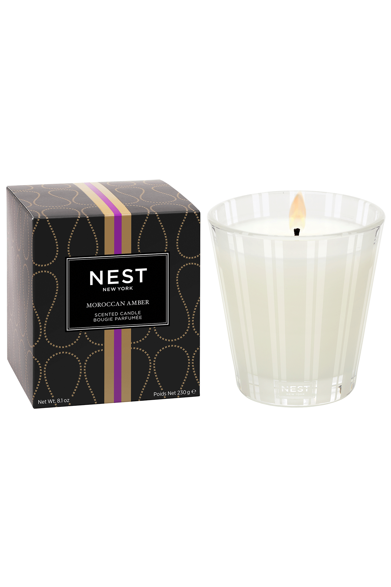 Bring exotic aromas into any room with this Moroccan Amber Classic Candle from Nest. Top notes of bergamot and eucalyptus mix with sweet patchouli and heliotrope, culminating in a sensual base of amber. Create an inviting atmosphere that's perfect for any occasion.