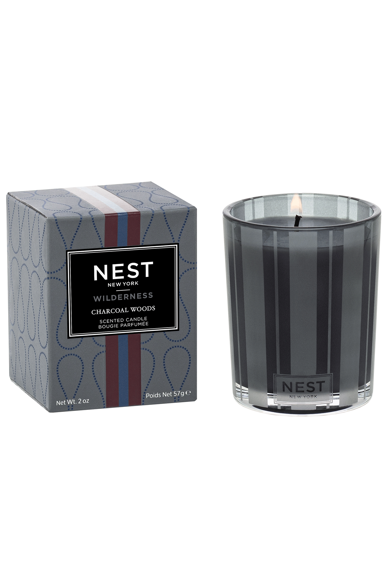 This exquisite candle from Nest is composed of heady notes of smoky labdanum, patchouli, and cedarwood, with a hint of black truffle and charred birchwood. Charcoal Woods Votive Candle adds a mysterious and inviting ambience to any home.