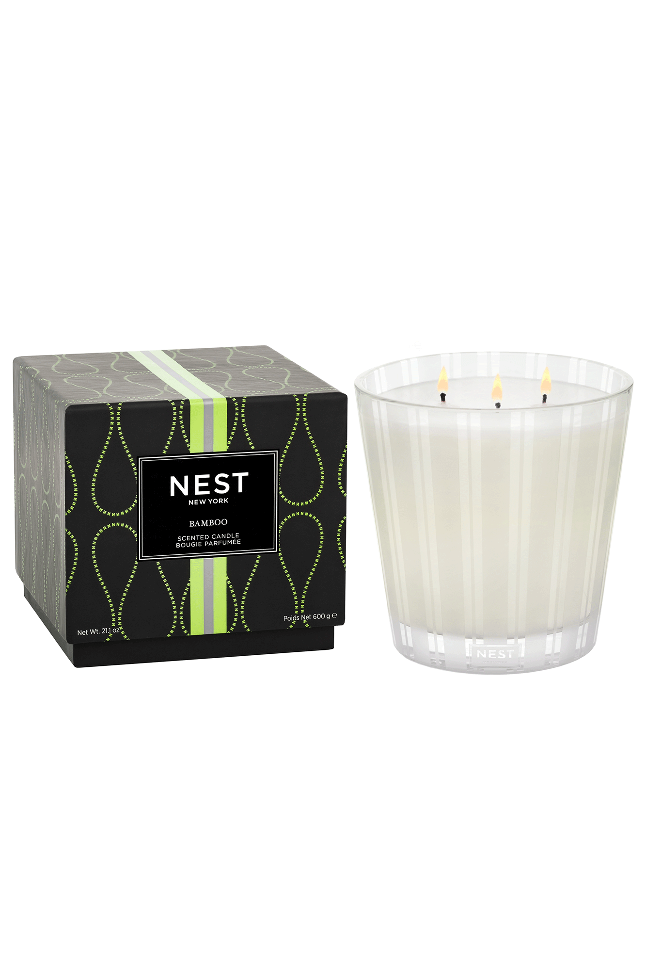 Experience nature's beauty with the NEST New York Bamboo 3-Wick Candle. Filled with a blend of white florals, lush green notes, and sparkling citrus, this iconic candle has a 4.7 star rating and a burn time of 75-100 hours, depending on the size chosen. Create a soothing aroma of a welcoming garden in any space.