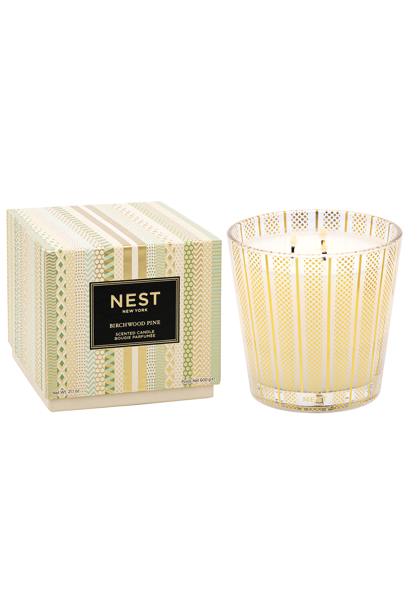 Bring the fresh scent of a winter forest into your home with our Birchwood & Pine 3 Wick Candle from Nest. This bestselling fragrance is crafted from a blend of white pine, fir balsam, and birchwood, layered over a warm base of amber and musk. Refresh your home and relax in the inviting aroma of nature.