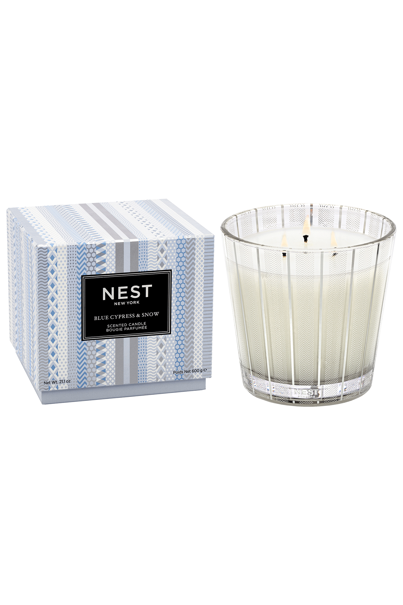 Light up your winter retreat with the Blue Cypress & Snow 3 Wick Candle from Nest. Fill the air with the perfect blend of notes such as blue cypress, juniper berry, and hints of smoked vanilla bean. Enjoy the inviting aroma of a mountain escape with this inviting 3-wick candle.