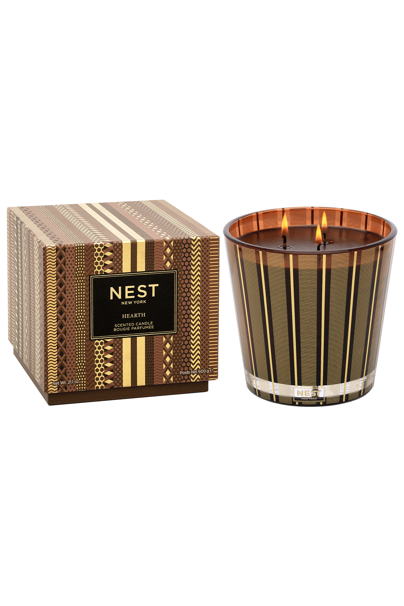 Experience the inviting ambiance of a cozy fireplace in your home with the Hearth 3 Wick Candle from Nest. An exquisite fragrance featuring oud wood, frankincense, and smoky embers creates a warm and inviting atmosphere. Perfect for adding a cozy touch to any evening.