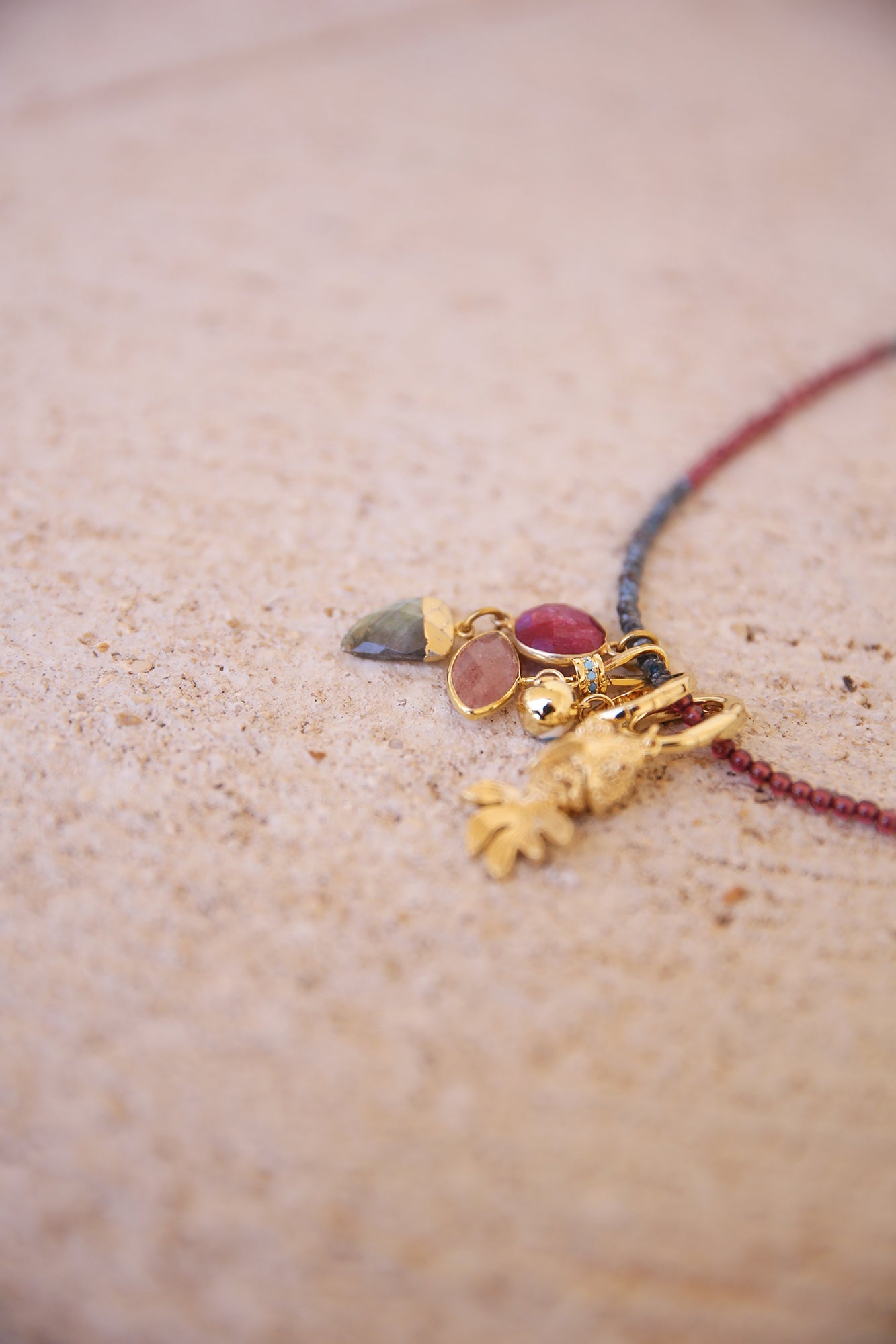 Necklace of Purple Garnet + Kyanite w/ 4 charms, inc. Ruby, Strawberry Quartz, Labradorite. Brass + 18K Gold Plated Findings