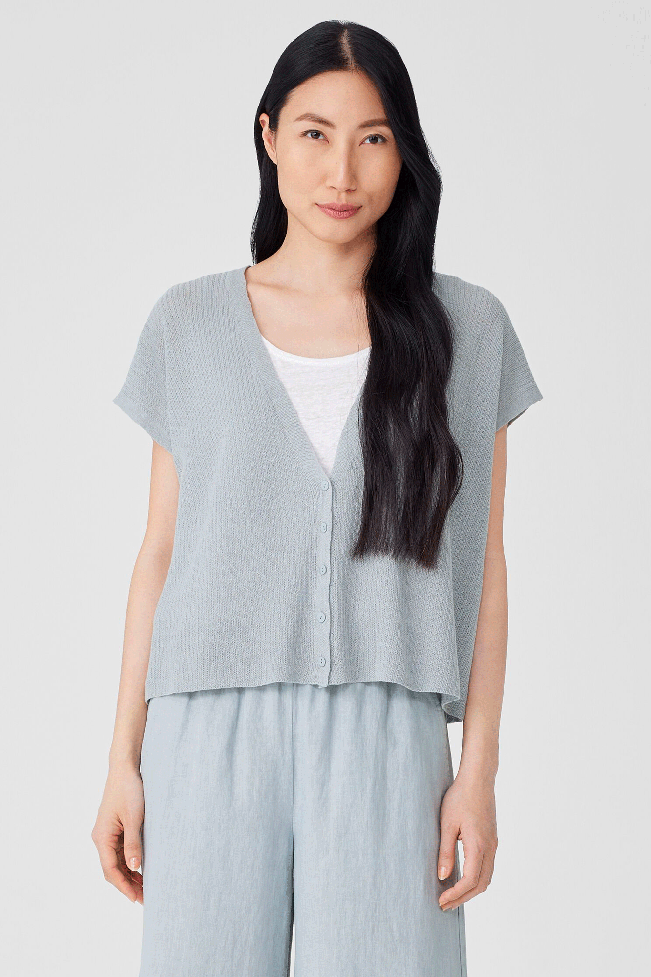 This two-in-one cardigan and vest from Eileen Fisher is crafted from a light blend of organic linen and cotton, creating a breezy, effortless layer for your wardrobe.