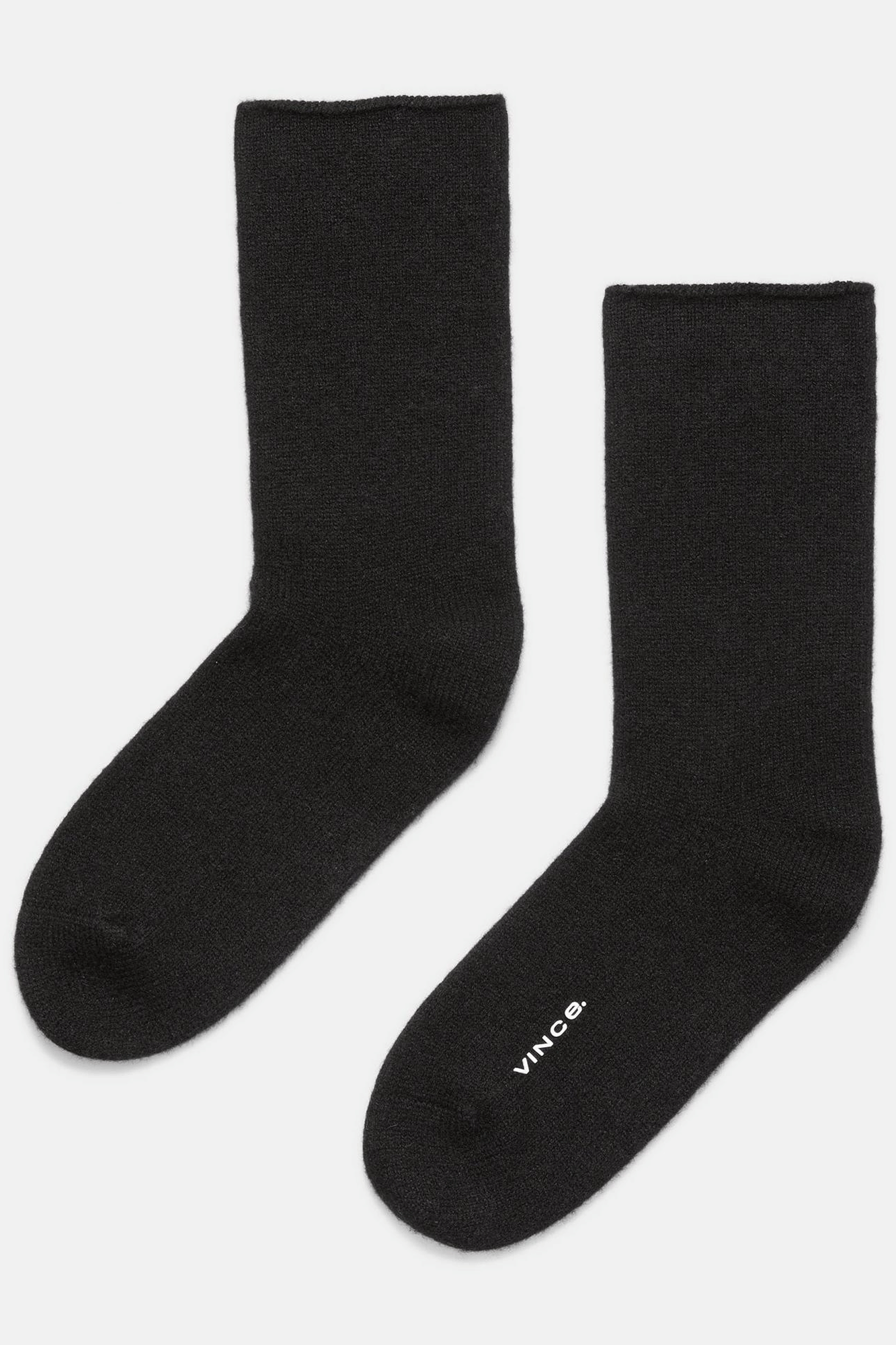 Experience the warmth and softness of cashmere on the coldest days with the Cashmere Jersey Short Sock from Vince. They are perfect for keeping your feet comfortable and indulged in natural luxury.