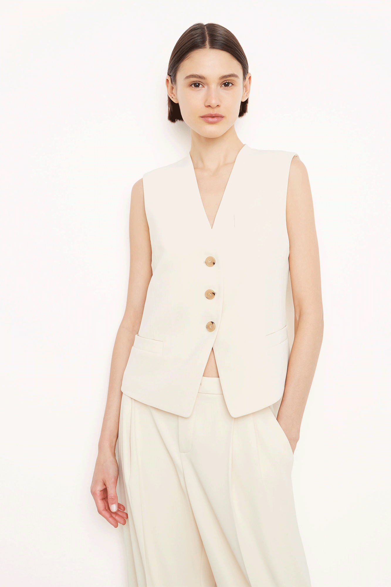 Update your wardrobe with this sophisticated Crepe Vest from Vince. It is fully lined for effortless layering. 
