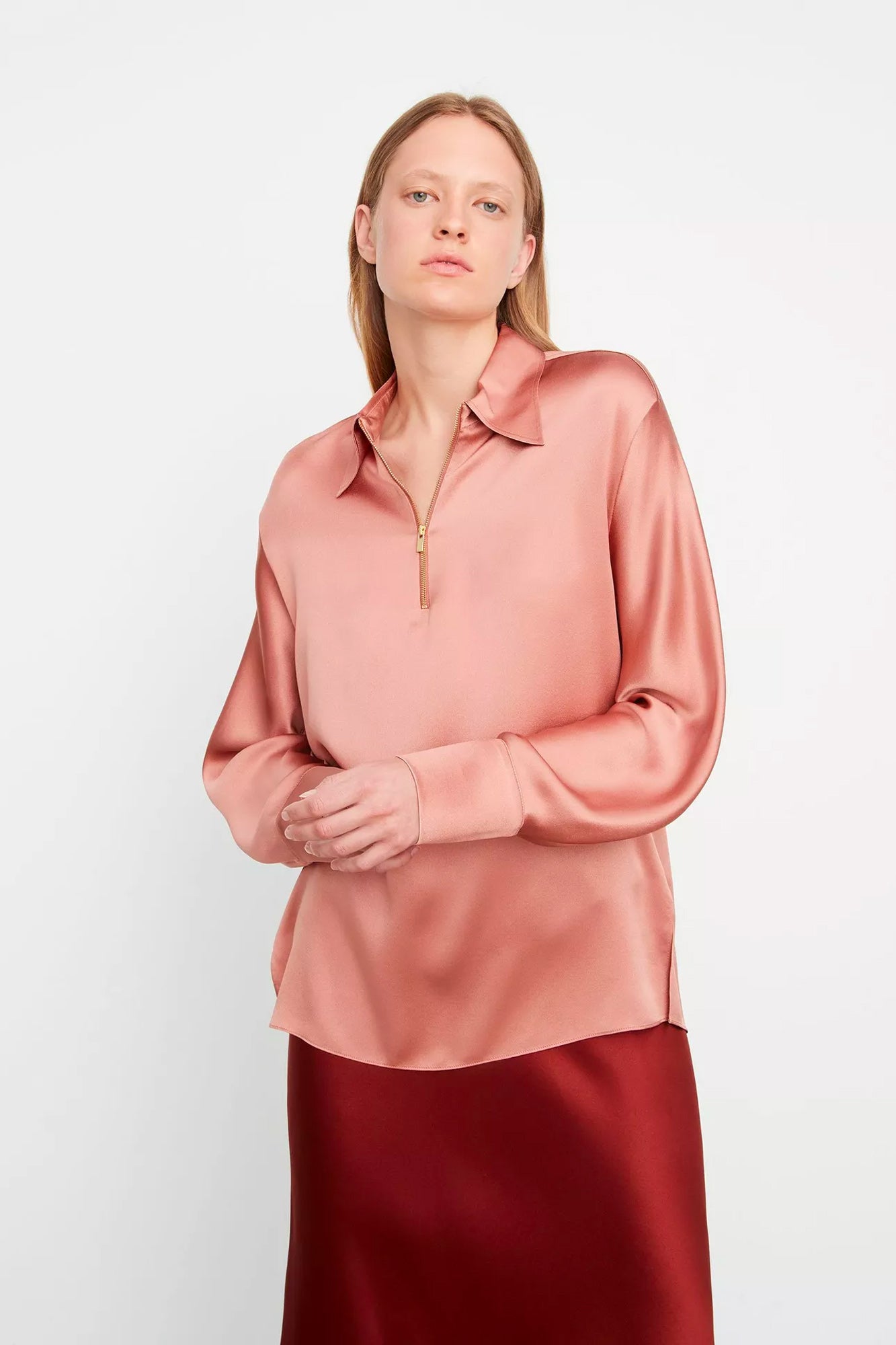 The Long-Sleeve Jewel Zipper Blouse from Vince is the perfect combination of professional and stylish.