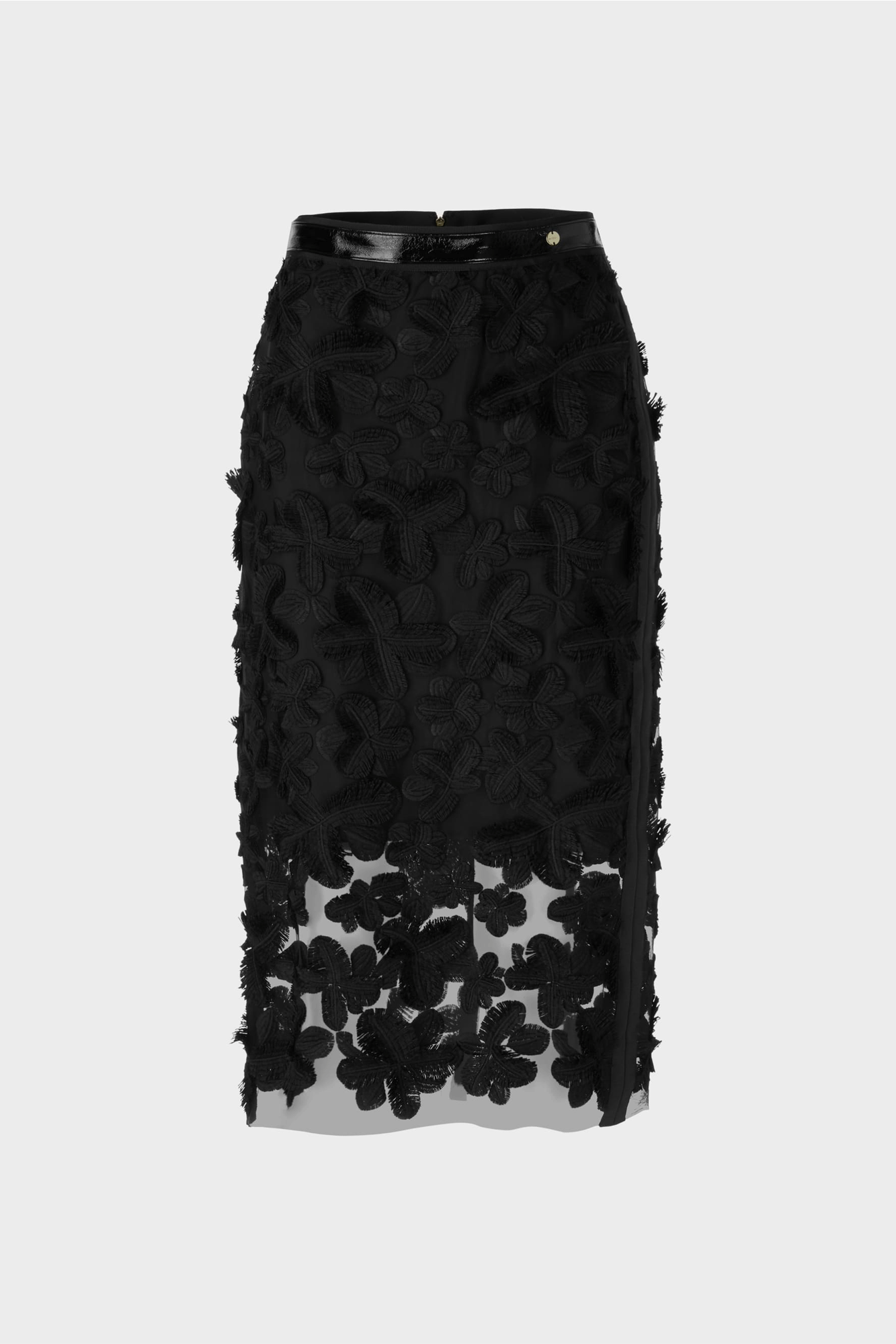 This stunning Contrast Extreme Midi Skirt from Marc Cain is crafted from a combination of tulle lace and translucent fabric. With a figure-hugging silhouette, it features an elegant floral design, back slit, and a concealed zip closure. These details combine to create a sophisticated and feminine look.