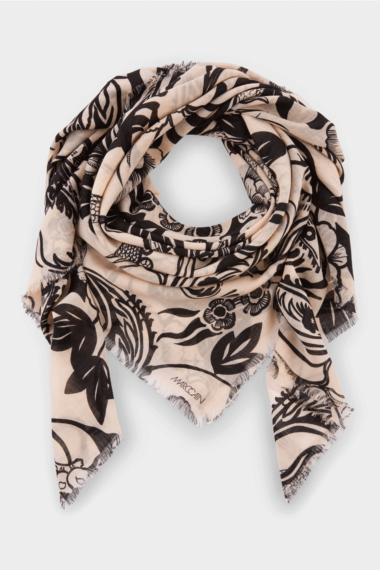 This Almond Blossom Scarf from Marc Cain is made of lightweight and loosely woven woollen yarn for a comfortable fit. The intricate print is inspired by mysterious tattoo designs featuring intertwined flora and dragon motifs. Its fringed edges provide a sophisticated finishing touch.