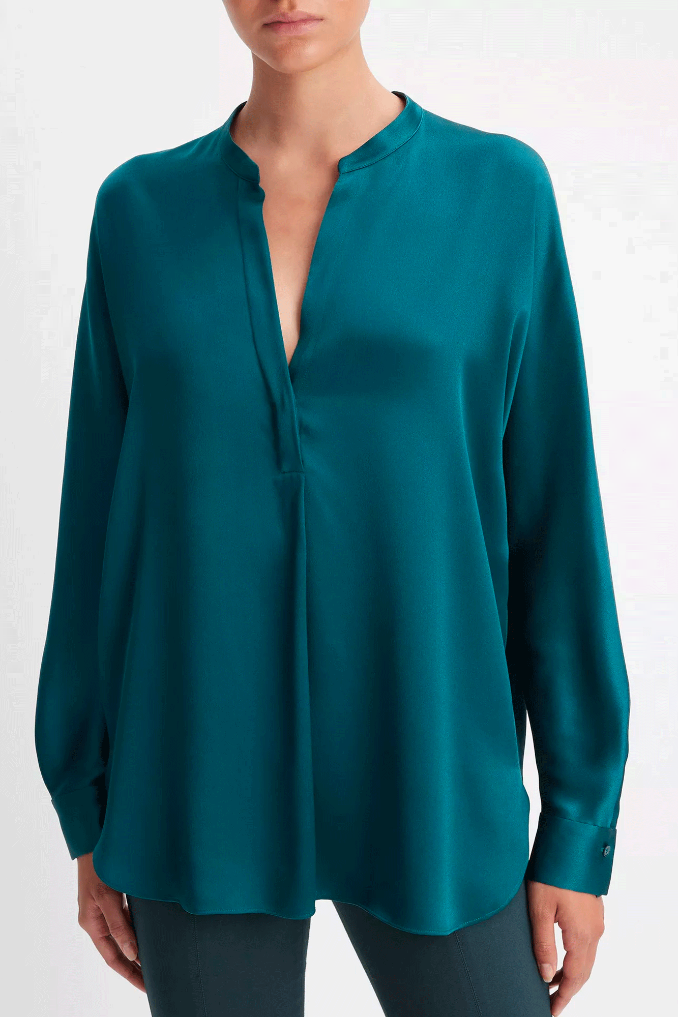 Experience classic femininity in this Band Collar Blouse from Vince. Crafted from smooth silk satin, it features a band collar, split neckline, and long sleeves, providing an effortlessly polished look for any occasion. Enjoy a timeless look with this elegant blouse.