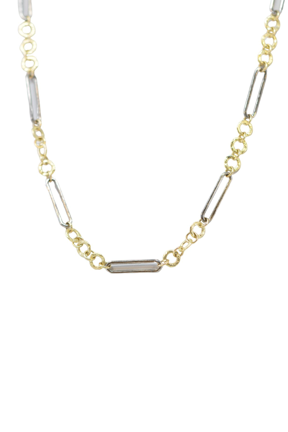 This elegant necklace from Armenta features paperclip-inspired links in 18k yellow gold and grey sterling silver. 