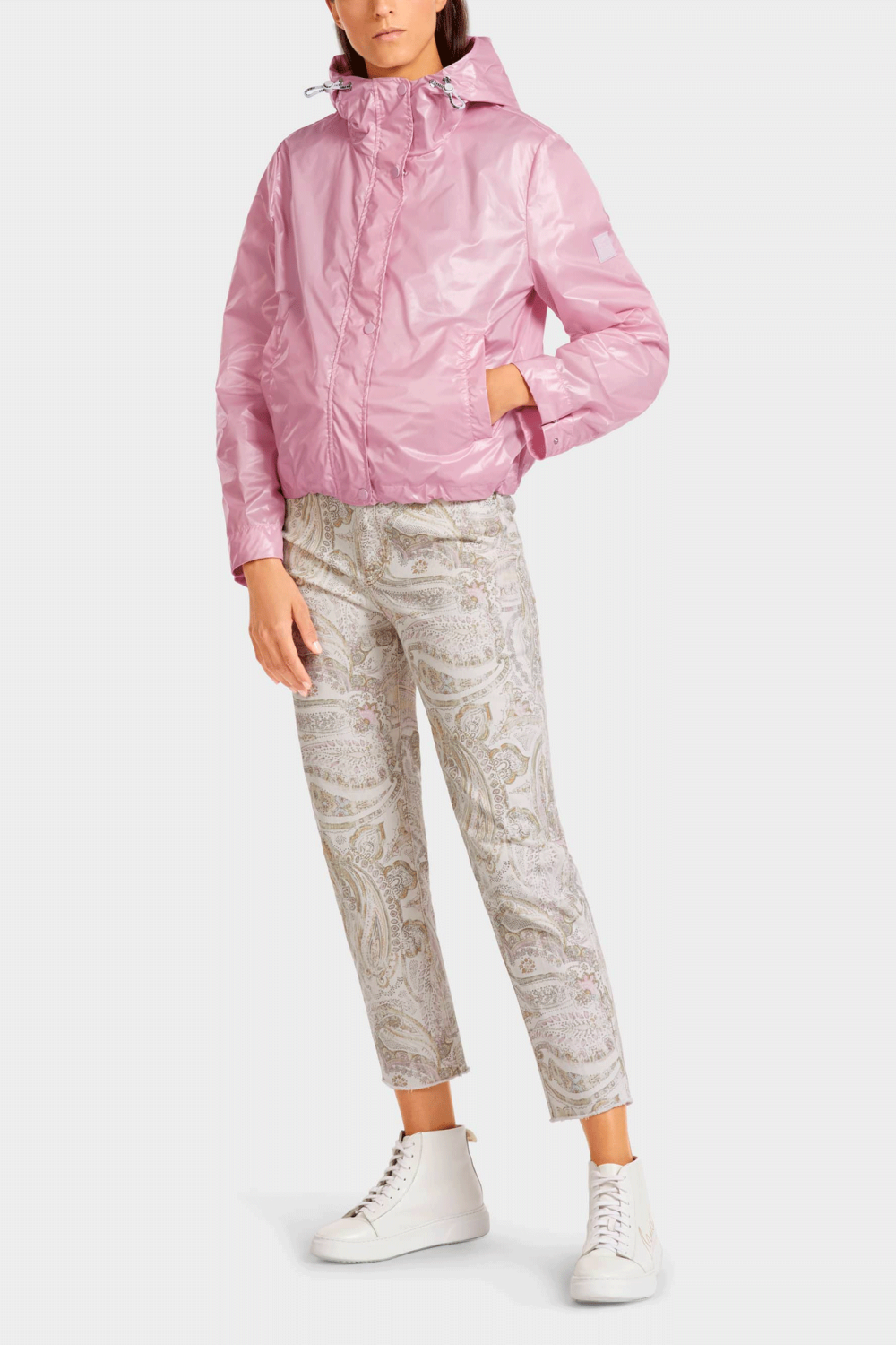 Be prepared for unpredictable weather with this Tough and Sweet Outdoor Jacket from Marc Cain. 